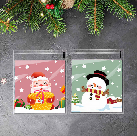 BOLSITAS NAVIDEÑAS Celofán Decoradas 10x10+3cm (100pz)